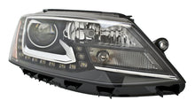 Load image into Gallery viewer, Hella 2013-2014 Volkswagen Jetta Headlight Assembly