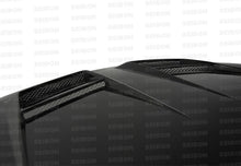 Load image into Gallery viewer, Seibon 10-11 VW Golf GTI 5K/MK6 DV Carbon Fiber Hood w/ Shaved Emblem